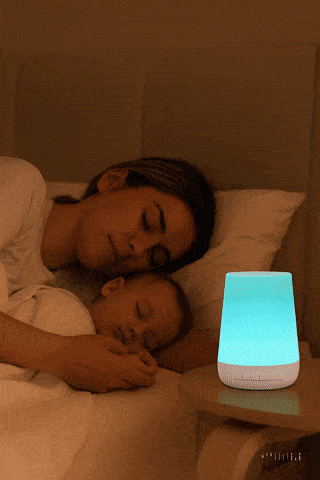Father and baby sleeping peacefully together with DreamHalo